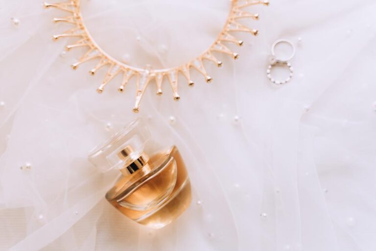 flatlay of bridal details on wedding day perfume e 2024 10 14 11 02 26 utc.jpg